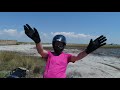 Riding motorbike on the beach of Black Sea. Zhelezniy Port, Ukraine. 2020.06.28