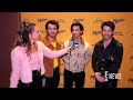 How The Jonas Brothers' Wives Predicted Their Hit Songs | E! News