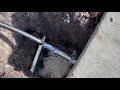 How To Run a Pipe Under a Slab or Sidewalk With a Garden Hose