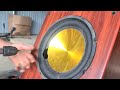 Repair genius girl: Repairing audio bass speakers with microscopic circuit board details.