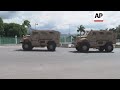 Kenyan police officers join local forces in a reconnaissance tour of Haiti's capital