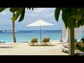 4K video of sandy beach at Amilla Maldives, a contemporary luxury resort with Soothing Guitar music