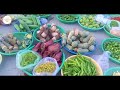 Review fresh foods in early morning in SambourMeas Chamkadoung market