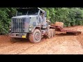 Climbing the slippery mountain with the Oshkosh M1070 in worse conditions