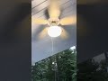 Unknown white ceiling fan running on warm summer night