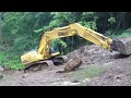 Steep slippery slope for a dozer and excavator