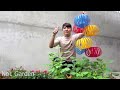 Recycle Plastic Bottles Into Hanging Lantern Flower Pots for Old Walls - Vertical Garden Ideas