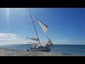 Sailboat washed ashore at Stump Pass