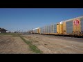 BNSF Railroad Southbound Autorack Train at Saginaw, Texas. Date 3-20-2021. Time 2:07pm. (HD video)