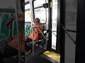 Crazy lady cracks a public bus window