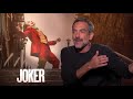 JOKER Joaquin Phoenix Interview: Meeting Batman, Going To A Dark Place, Sequel, The Joker Laugh