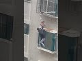 Neighbours rescue boy dangling from 4th-floor window in China #ytshorts