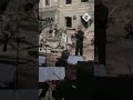 Orchestra performs requiem on site of children's hospital hit by Russian missile