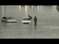 ON CAM: Drivers rescued from stranded cars on flooded DVP