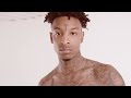 21 Savage Breaks Down His Tattoos | GQ