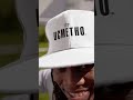 video of a football fan wearing a snapback hat
