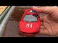 Super Dirty Toy Car Falling Into Clean Water