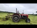 Turning grass with massey 35 and lely hayzip