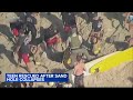 Sand hole collapses on teen girl, trapping her 8 feet under