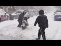 2-1-2021 Queens, NY Heavy snow causes chaos, cars stuck, guy on moped, wreck