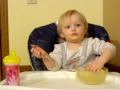 1-1/2 year old Emma Eating Mac n Cheese ... Or is it Eating Her? CUTE!