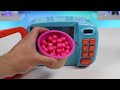 Feeding Mr. Play Doh Head Rainbow Gumballs from Dubble Bubble Candy Dispenser!