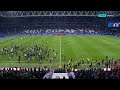 PITCH INVASION: Barcelona players flee as Espanyol fans storm the pitch