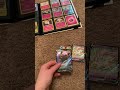Unboxing/reviewing pokemon cards (Eevee evolutions)