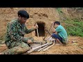 The boy and his brother building a cave as a new shelter