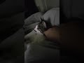 Petting my cat before bedtime.