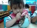 sleepy chinese girl eating
