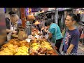 Hong Kong Street Food. Chopping Piglets, Ducks, Pigeons, Chickens in Sham Shui Po