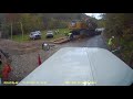 Loading a excavator on a lowboy 3