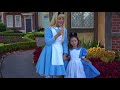 Mini Alice meets the real Alice in Wonderland at Epcot