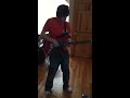 My brother playing electric guitar