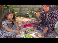 Village life in Iran : cooking chicken in village style for lunch
