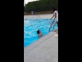 Kid rides bike into pool