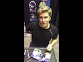 I talk with Vic Mignogna while he signs multiple characters