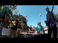 Gainesville band Flat Land performs on a bicycle towed trailer at 2014 UF Homecoming Parade