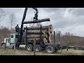Hauling logs with a knuckle boom (HUGE LOAD)