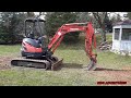 Kubota U25 Excavator in action taking out two Pear Trees