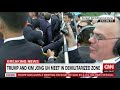 Trump and Kim Jong Un shake hands at DMZ
