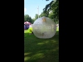 Tyler and Ryan in a large hamster wheel