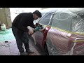 The process of restoring a car that has been in an accident to like new