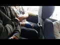 Child rages with toys in bus