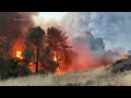 California wildfire sparked by a burning car triples in size in a day