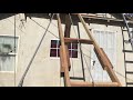 How to lift a evaporative cooler to the roof using a pulley.