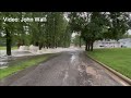 Rushing floodwaters caught on video after dam breaks in Nashville, Illinois