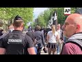 French far-right activists march through streets of Paris