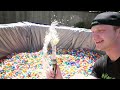 PUTTING 50,000 GUMBALLS IN A LEGO POOL!
